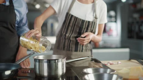 Two Chefs Cooking Talking Stock-Footage 169478104