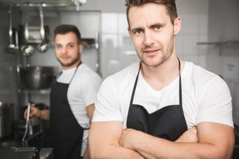 Two chefs in kitchen Stock Photos