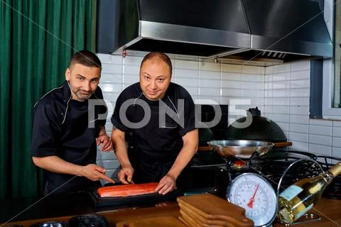 Two Chefs At Work In A Restaurant. Chef,cook,job.