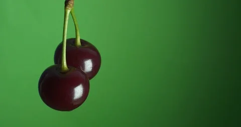 Two cherries on a peduncle spinning Stock Footage 92060067