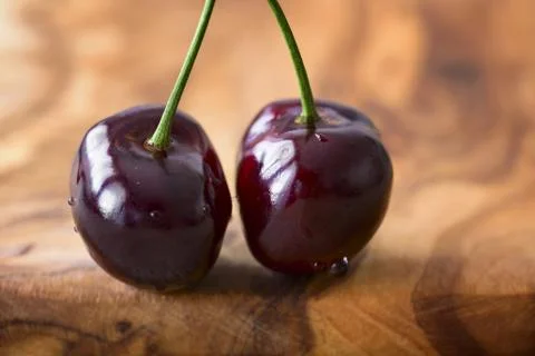 Two cherries Stock Photos