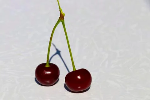 Two cherries Stock Photos