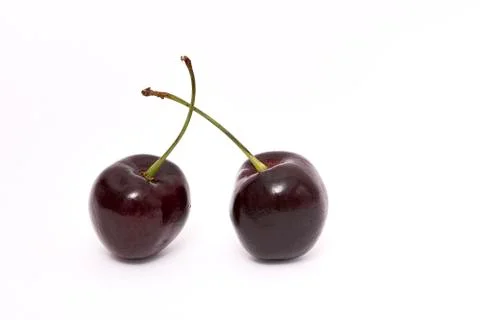 Two Cherries on white Stock Photos