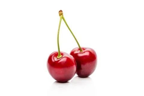 Two Cherry on a peduncle isolated on a white background Stock Photos