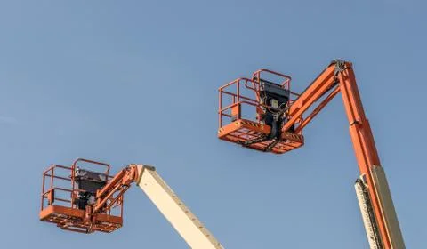 Two Cherry Picker Machines Stock Photos
