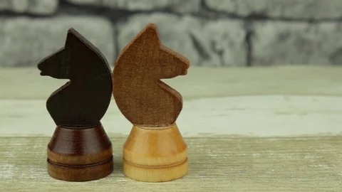 Two chess black and white knights Stock Footage 78223268