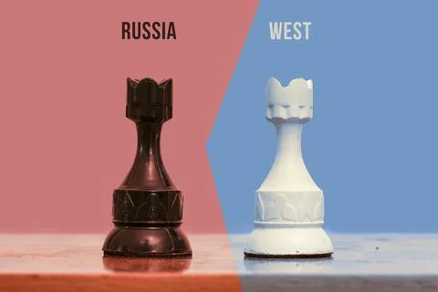 Two chess figures - showing confrontation between Russia and the West Stock Photos