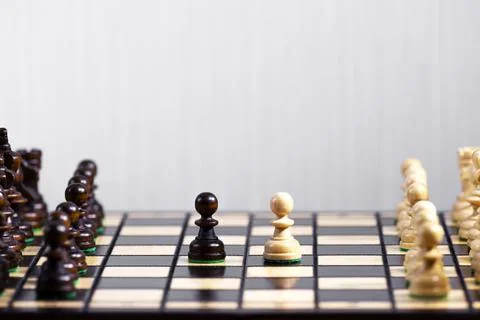 Two Chess Pawn Standing next to each other, The first step of the game Stock Photos