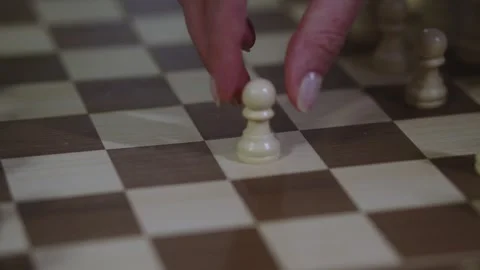 Two chess players play chess, chess pieces are placed on the board Stock Footage 297371294