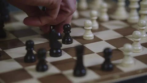 Two chess players play chess, chess pieces are placed on the board Stock Footage 297587011