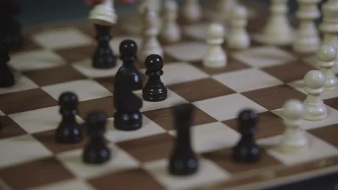 Two chess players play chess, chess pieces are placed on the board Stock Footage 297587113