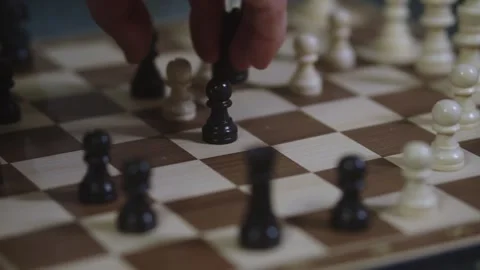 Two chess players play chess, chess pieces are placed on the board Stock Footage 297587254
