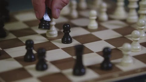 Two chess players play chess, chess pieces are placed on the board Stock Footage 297587424