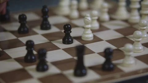 Two chess players play chess, chess pieces are placed on the board Stock Footage 297587509