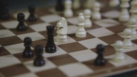 Two chess players play chess, chess pieces are placed on the board Stock Footage 297587903