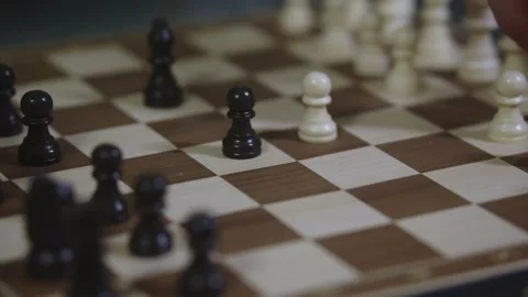 Two chess players play chess, chess pieces are placed on the board Video stock 297588445