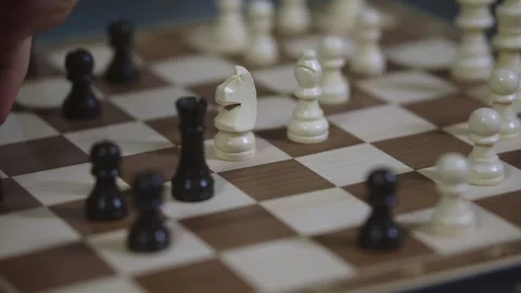 Two chess players play chess, chess pieces are placed on the board Stock Footage 297590146