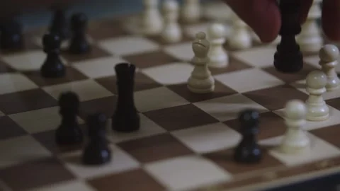 Two chess players play chess, chess pieces are placed on the board Stock Footage 297590211