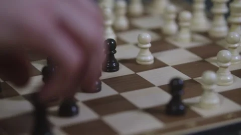 Two chess players play chess, chess pieces are placed on the board Stock Footage 297755606
