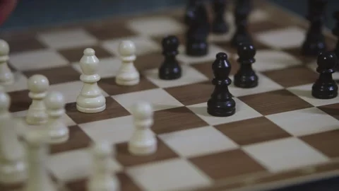 Two chess players play chess, chess pieces are placed on the board Stock Footage 298076319
