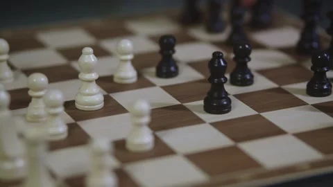 Two chess players play chess, chess pieces are placed on the board Stock Footage 298076382