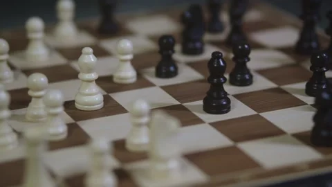 Two chess players play chess, chess pieces are placed on the board Video stock 298077638