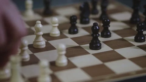 Two chess players play chess, chess pieces are placed on the board Video stock 298078475