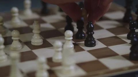 Two chess players play chess, chess pieces are placed on the board Stock Footage 298079040