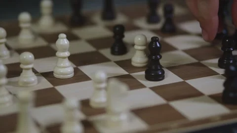 Two chess players play chess, chess pieces are placed on the board Stock Footage 298079827