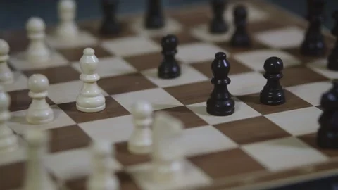 Two chess players play chess, chess pieces are placed on the board Stock Footage 298080786