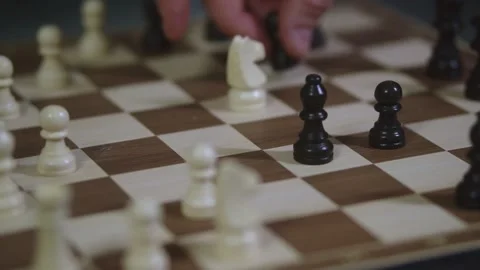 Two chess players play chess, chess pieces are placed on the board Stock Footage 298081892
