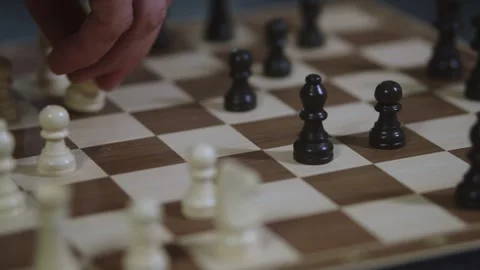 Two chess players play chess, chess pieces are placed on the board Stock Footage 298081893