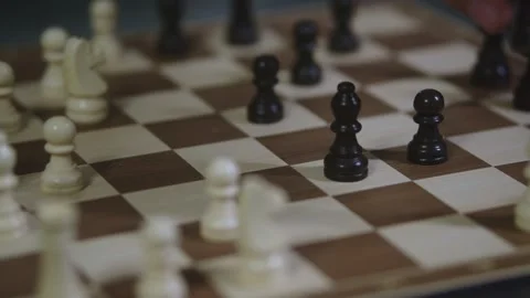Two chess players play chess, chess pieces are placed on the board Stock Footage 298081894