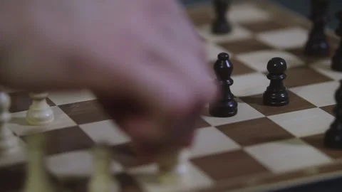 Two chess players play chess, chess pieces are placed on the board Video stock 298082116