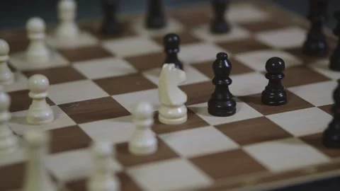 Two chess players play chess, chess pieces are placed on the board Stock Footage 298082827