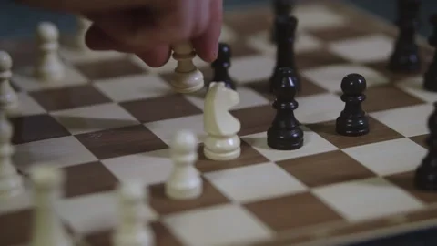 Two chess players play chess, chess pieces are placed on the board Stock Footage 298082910