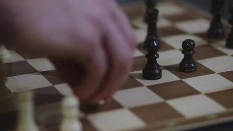 Two chess players play chess, chess pieces are placed on the board Video stock 298082911