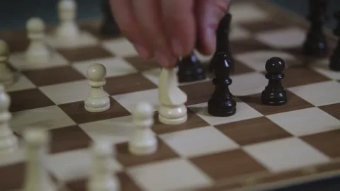 Two chess players play chess, chess pieces are placed on the board Video stock 298083262