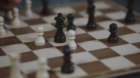Two chess players play chess, chess pieces are placed on the board Stock Footage 298084364
