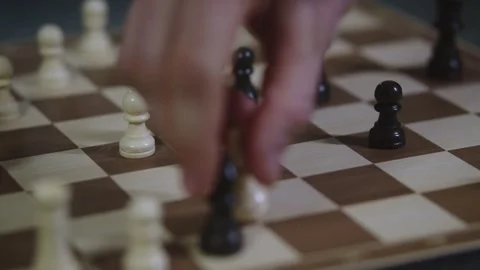 Two chess players play chess, chess pieces are placed on the board Stock Footage 298084470