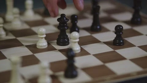 Two chess players play chess, chess pieces are placed on the board Stock Footage 298084572