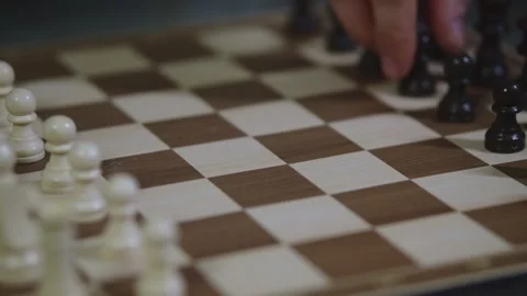 Two chess players play chess, chess pieces are placed on the board Stock Footage 298085833