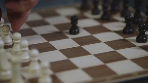 Two chess players play chess, chess pieces are placed on the board Stock Footage 298086002