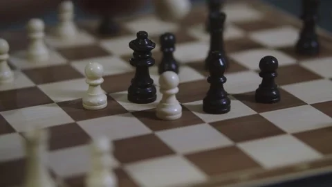 Two chess players play chess, chess pieces are placed on the board Stock Footage 298086245