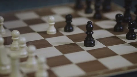Two chess players play chess, chess pieces are placed on the board Stock Footage 298086320