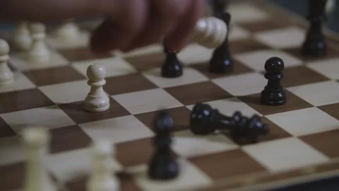 Two chess players play chess, chess pieces are placed on the board Stock Footage 298086620