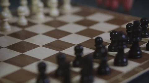 Two chess players play chess, chess pieces are placed on the board Video stock 298086699