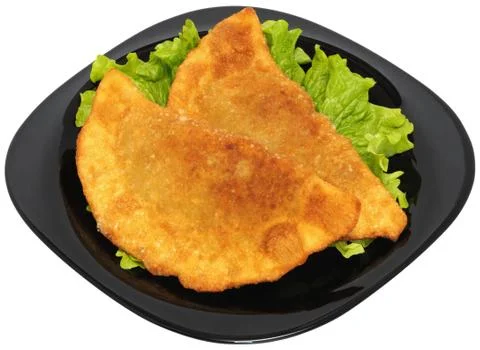 Two Chiburekki on a sheet of Lettuce Stock-Fotos