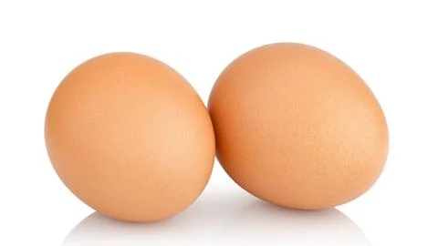 Two chicken eggs Stock Photos