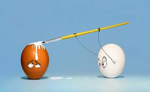 Two chicken eggs, white and brown, are preparing for Easter, and paint each.. Stock Photos